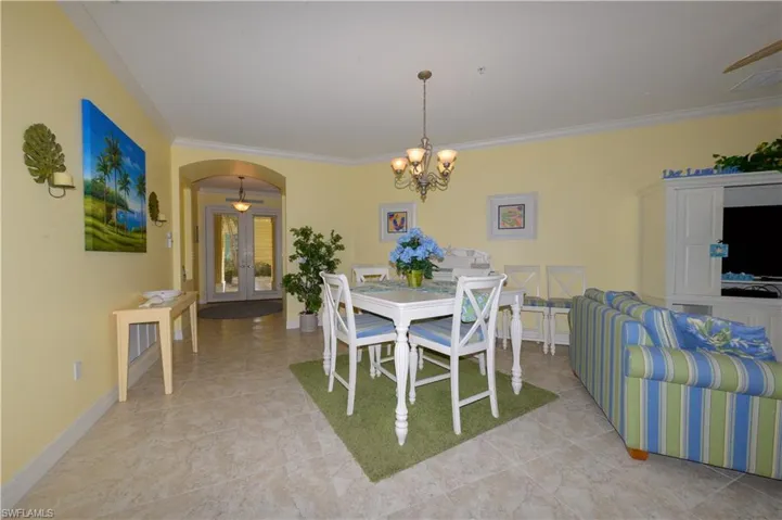 Spacious dining area  Features 20" diagonal tile flooring, 10' ceilings, Crown molding & more!