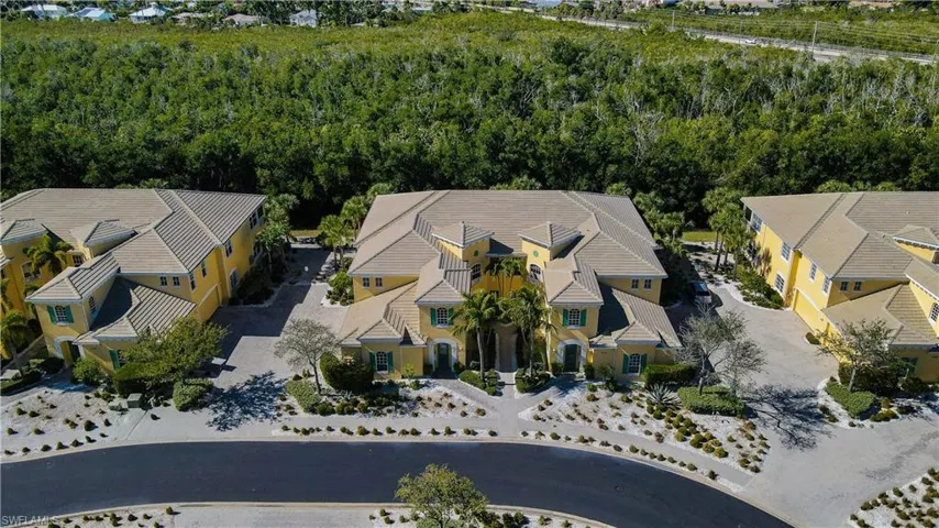 Aerial View of Condo Building Showing natural creek and Preserve views