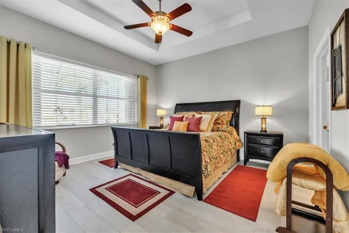 luxury vinyl floor and tray ceiling