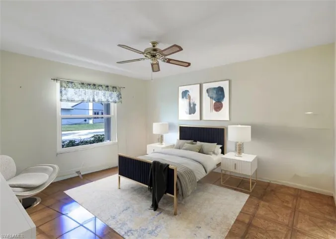 Staged bedroom with ceiling fan