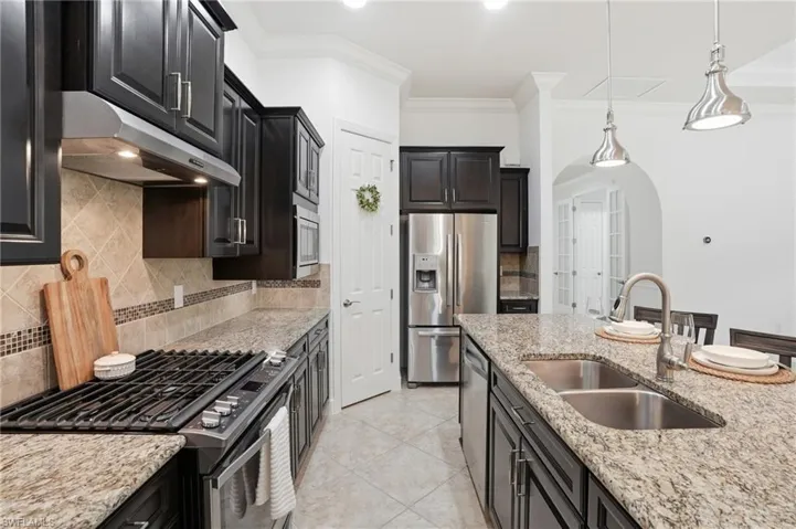 9436 Whooping Crane Way, Naples, Florida 34120