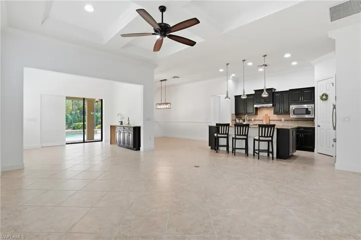 9436 Whooping Crane Way, Naples, Florida 34120