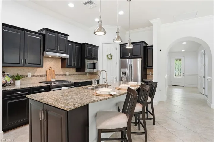 9436 Whooping Crane Way, Naples, Florida 34120