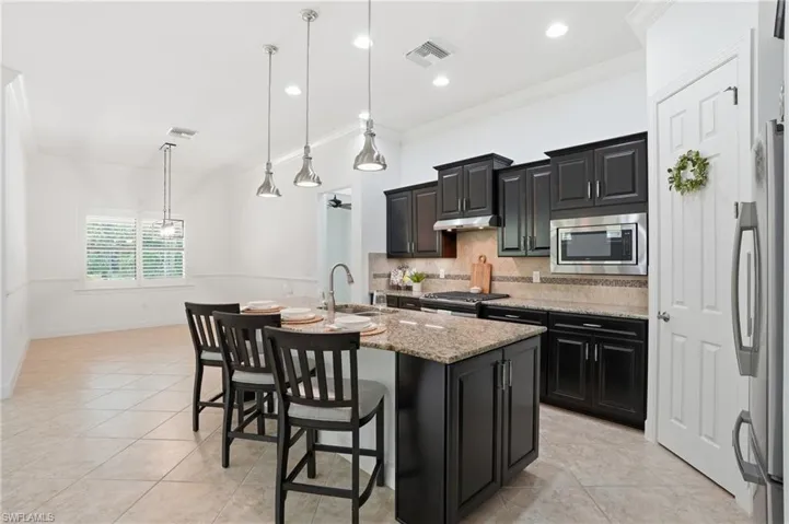 9436 Whooping Crane Way, Naples, Florida 34120