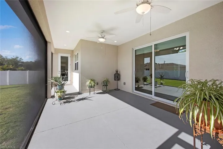 View of patio with ceiling fan