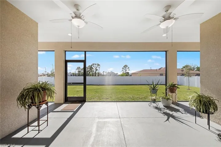 Covered Lanai featuring ceiling fan