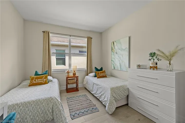 Bedroom with light wood-type flooring