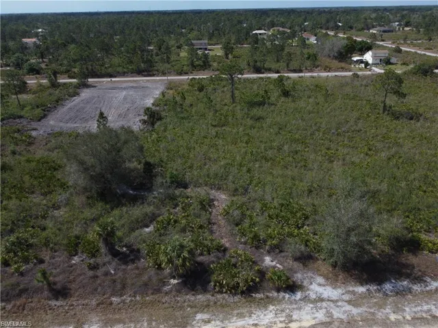 Aerial view of a lightly wooded area