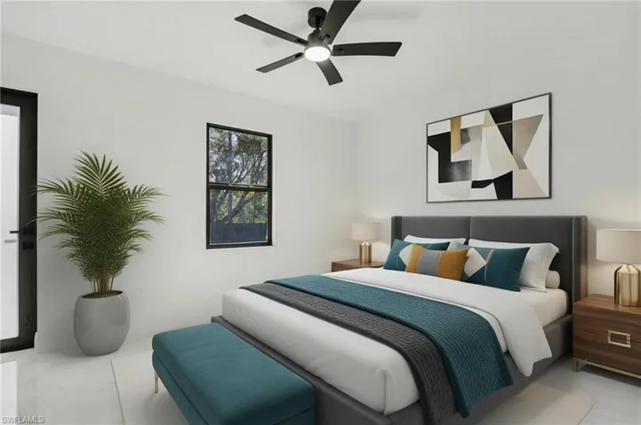 Bedroom featuring a ceiling fan