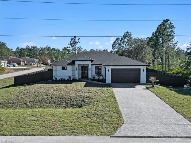Corner lot single-family home with modern stucco exterior