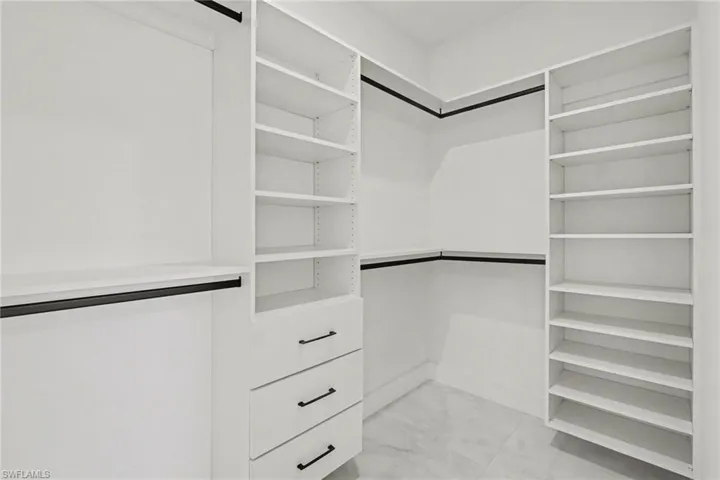 Walk-in closet with custom shelving
