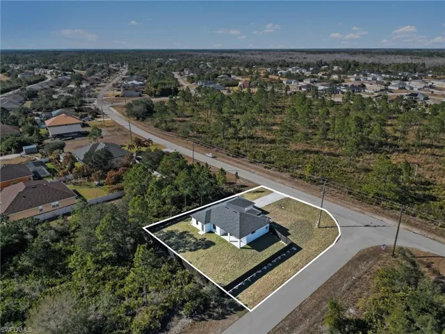 Aerial view of surrounding residential area