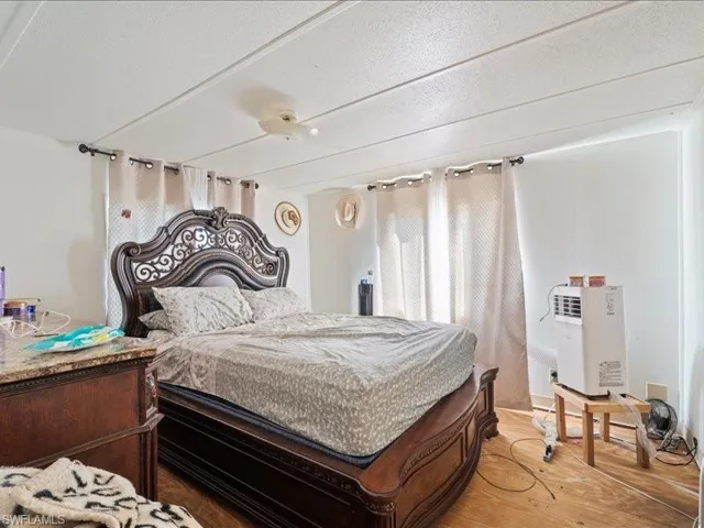 Bedroom featuring hardwood / wood-style floors