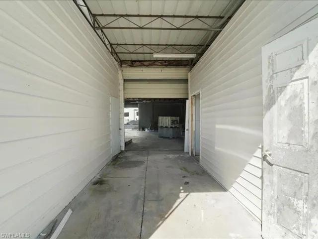 Hallway with concrete floors