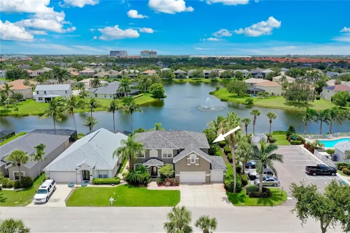 Aerial view of the front structure featuring the community and lake