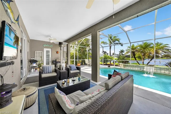 Patio with an outdoor lounge area and a pool