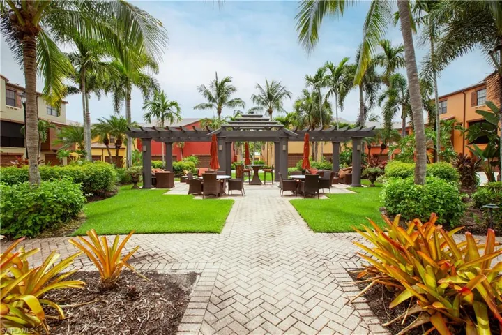 View of nearby features featuring a pergola, a yard, and a patio area