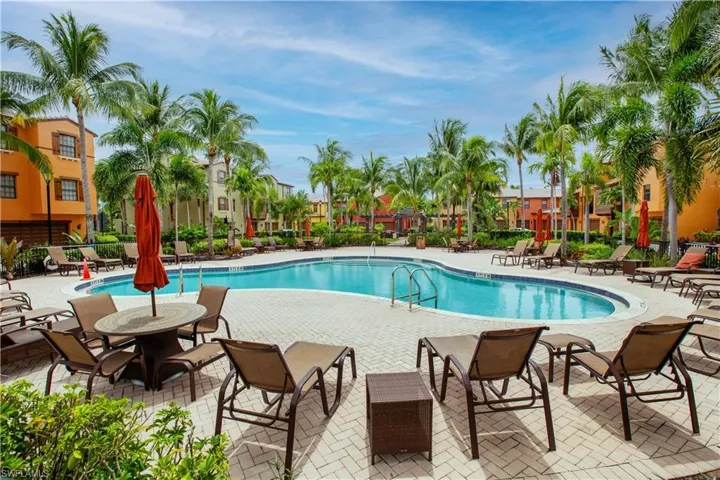 View of courtyard pool with lovely loungers
