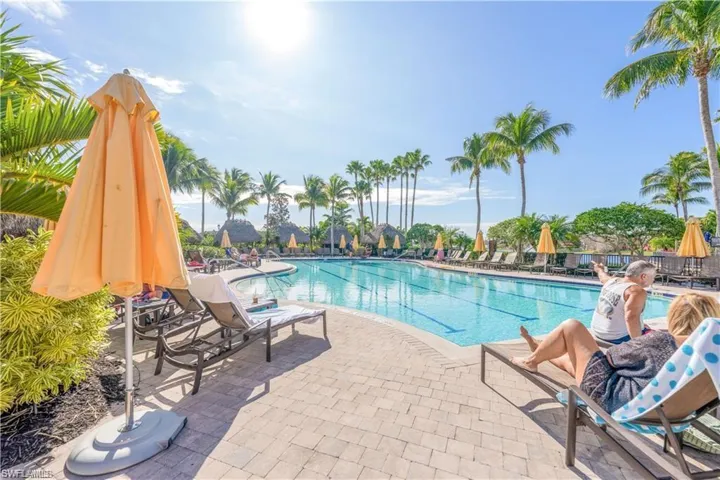 Community pool featuring a patio area