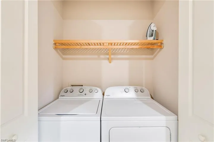 Laundry area featuring separate washer and dryer