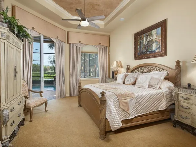 Elegant master suite, slider door access to lanai, pool, spa and waking up to that gorgeous view