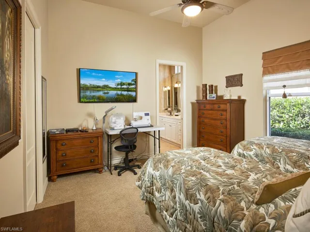 Second ensuite guest bedroom with twin beds.  This room now is also used as a hobby room