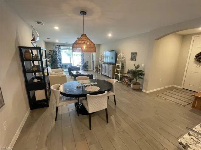 Dining space with light wood-type flooring