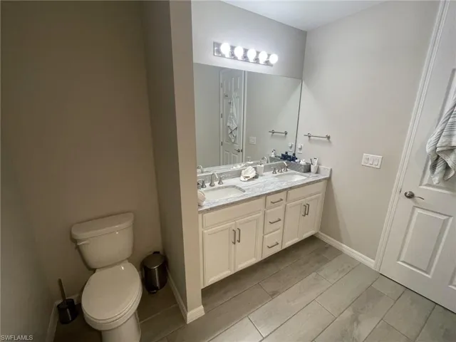 Bathroom with vanity and toilet