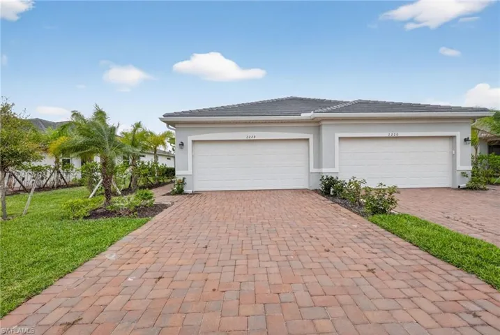 Garage with decorative driveway