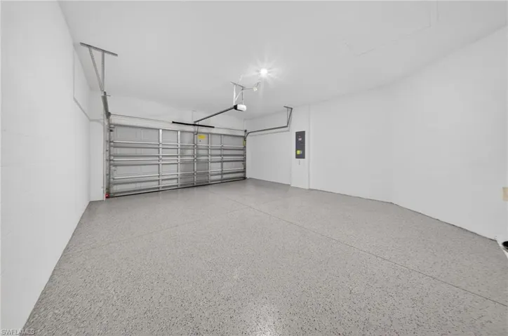 Garage featuring electric panel