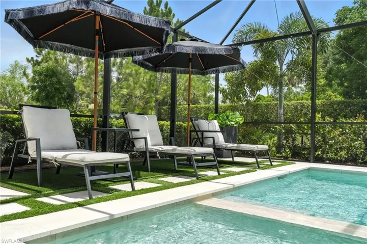 Outdoor pool featuring a patio area
