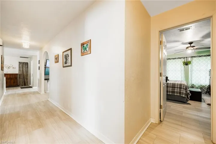 Corridor featuring light hardwood / wood-style flooring