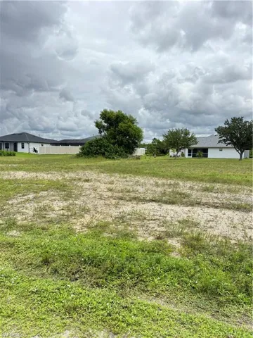 View of yard with a rural view