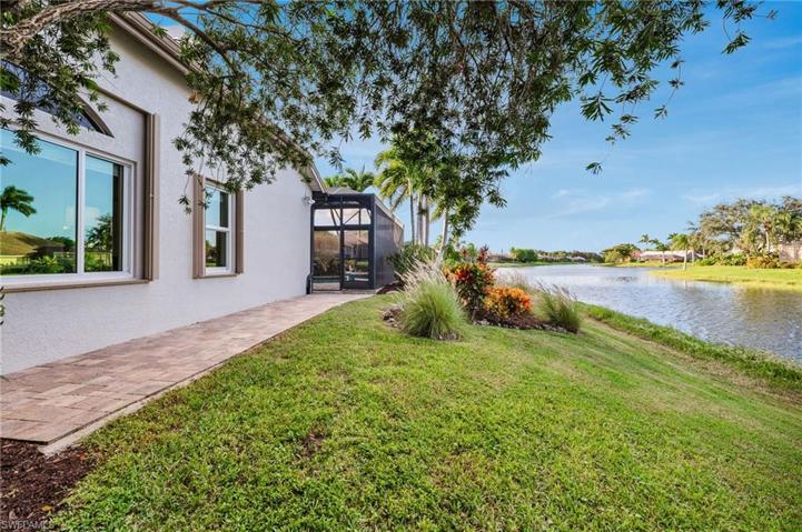 Features an extended paver patio outside of the screen enclosure
