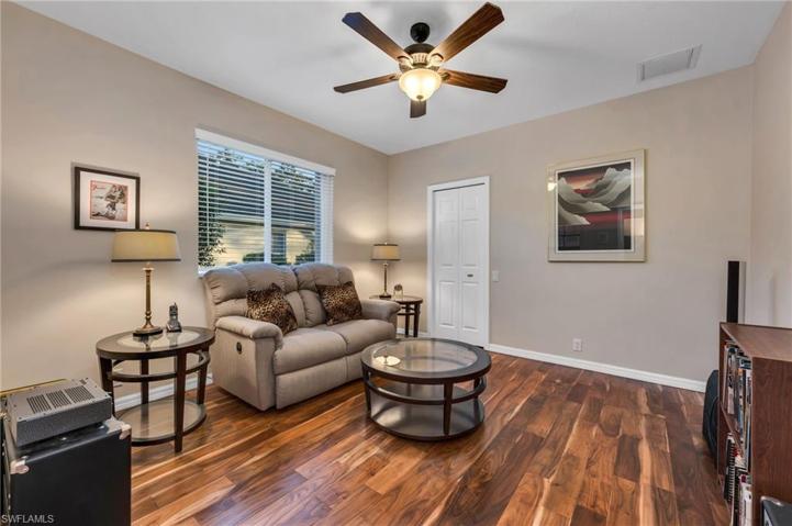 Guest bedroom w Acacia wood flooring