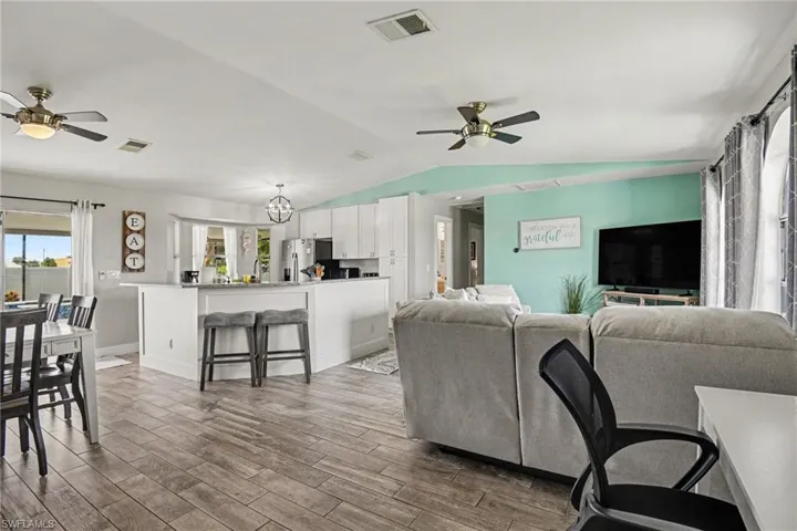 Beautiful natural lighting, well equipped kitchen, comfortable living and dining areas.