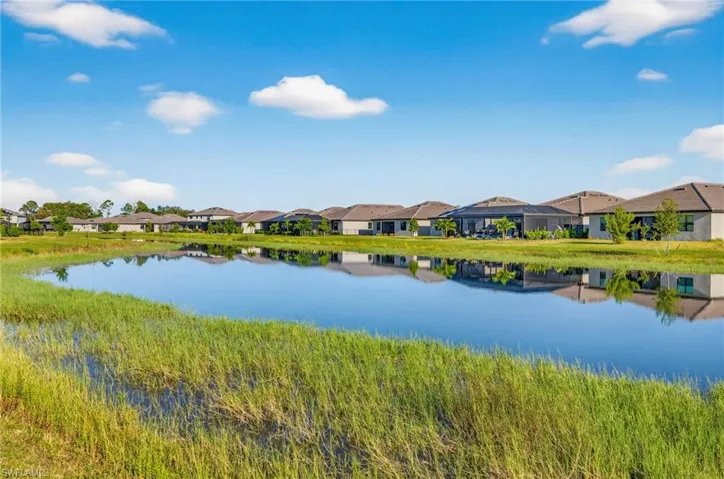 Water view featuring nearby suburban area