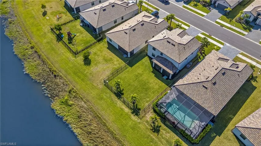 Aerial view of residential area with a large body of water