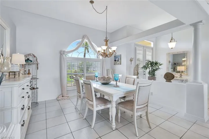 Dining space with chandelier and a wealth of natural light