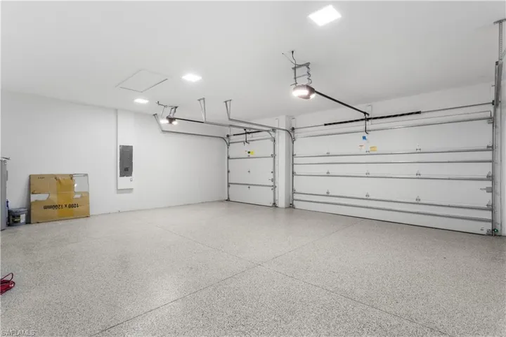 3-CAR GARAGE provides PLENTY STORAGE!