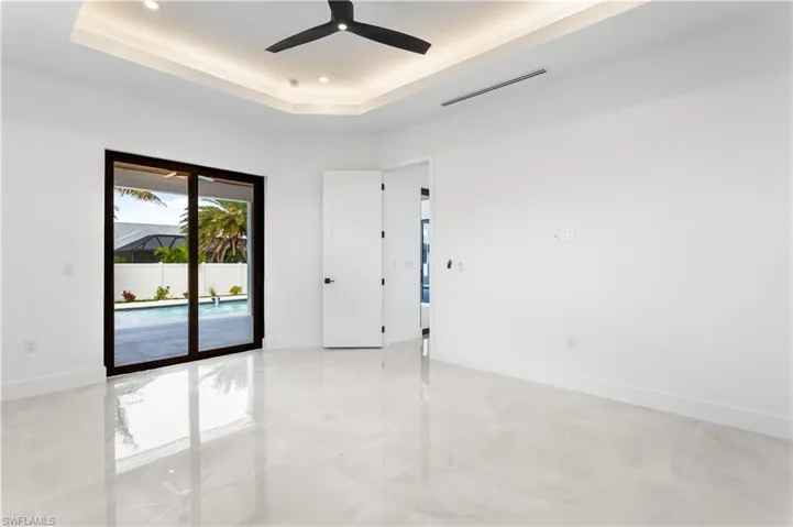 MASTER SUITE is TRUE RETREAT, offering SPACIOUS BEDROOM & private sliding doors to lanai!