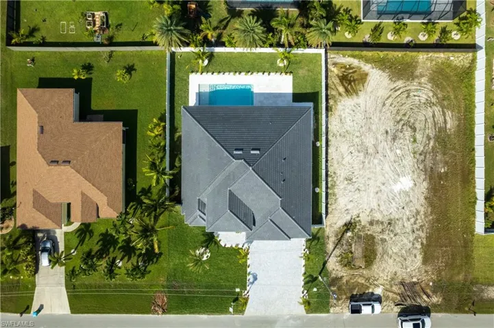 This home is equipped with durable tile roofing, offering long-lasting protection and excellent curb appeal. Not only does it enhance the property's value, but it also provides superior weather resistance and energy efficiency.