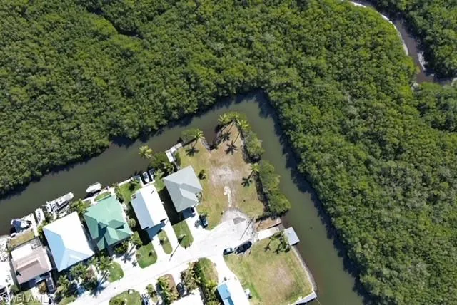 View of property location with a nearby body of water