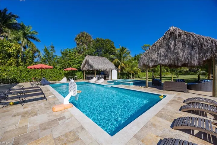 View of pool with a gazebo, a patio, an outdoor living space, and a pool with connected hot tub