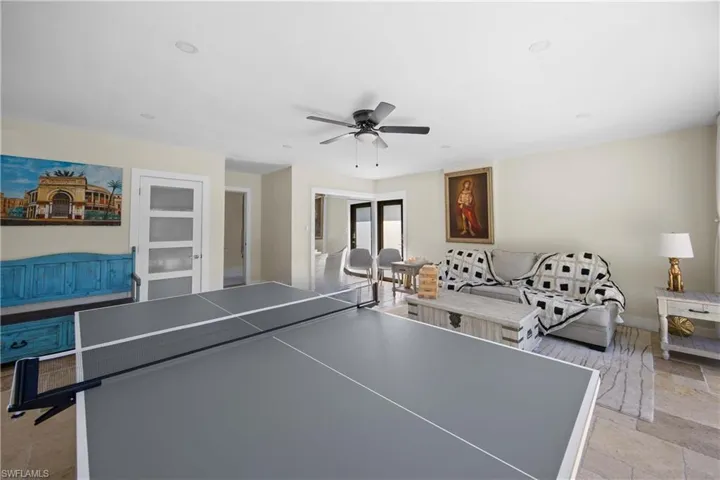 Rec room featuring a ceiling fan and recessed lighting