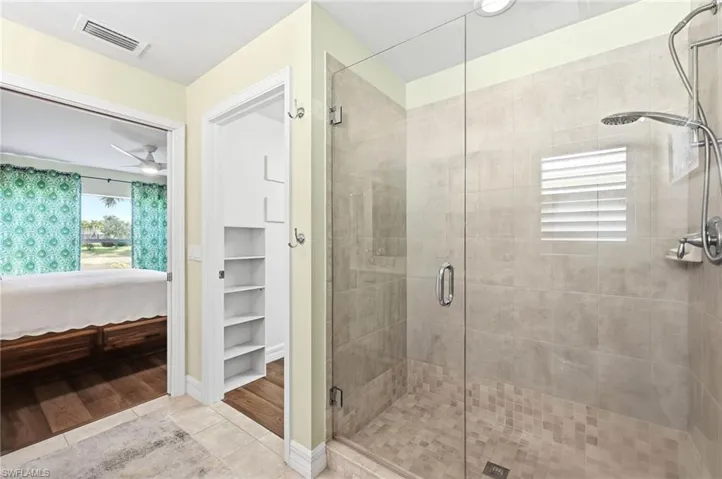 Master Bathroom with walk-in closet ant walk-in Shower