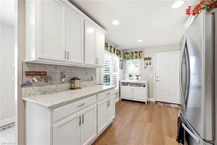 Modern Kitchen with plenty of cabinets and access to the Garage
