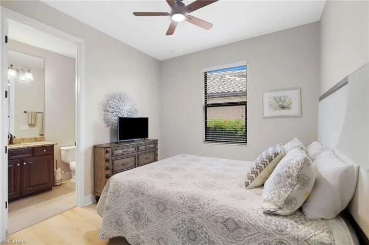 En-Suite Guest Bedroom with newly installed LVP Flooring