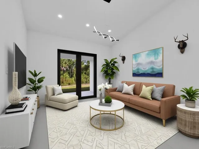 Living room featuring recessed lighting and french doors