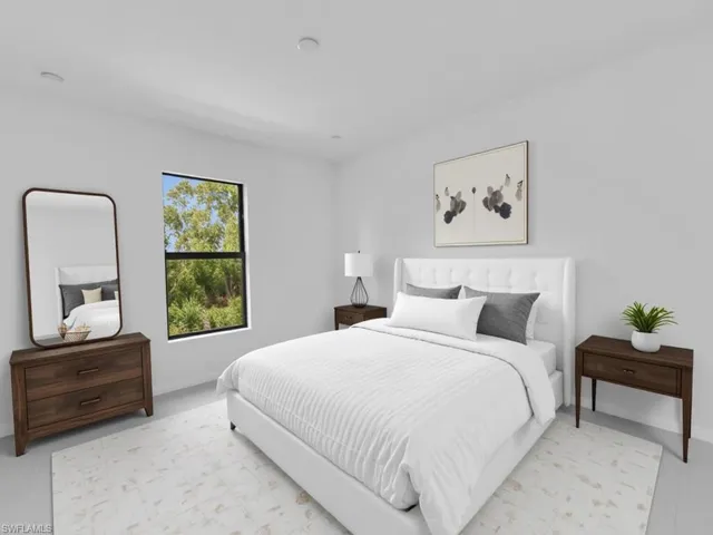 Bedroom featuring baseboards